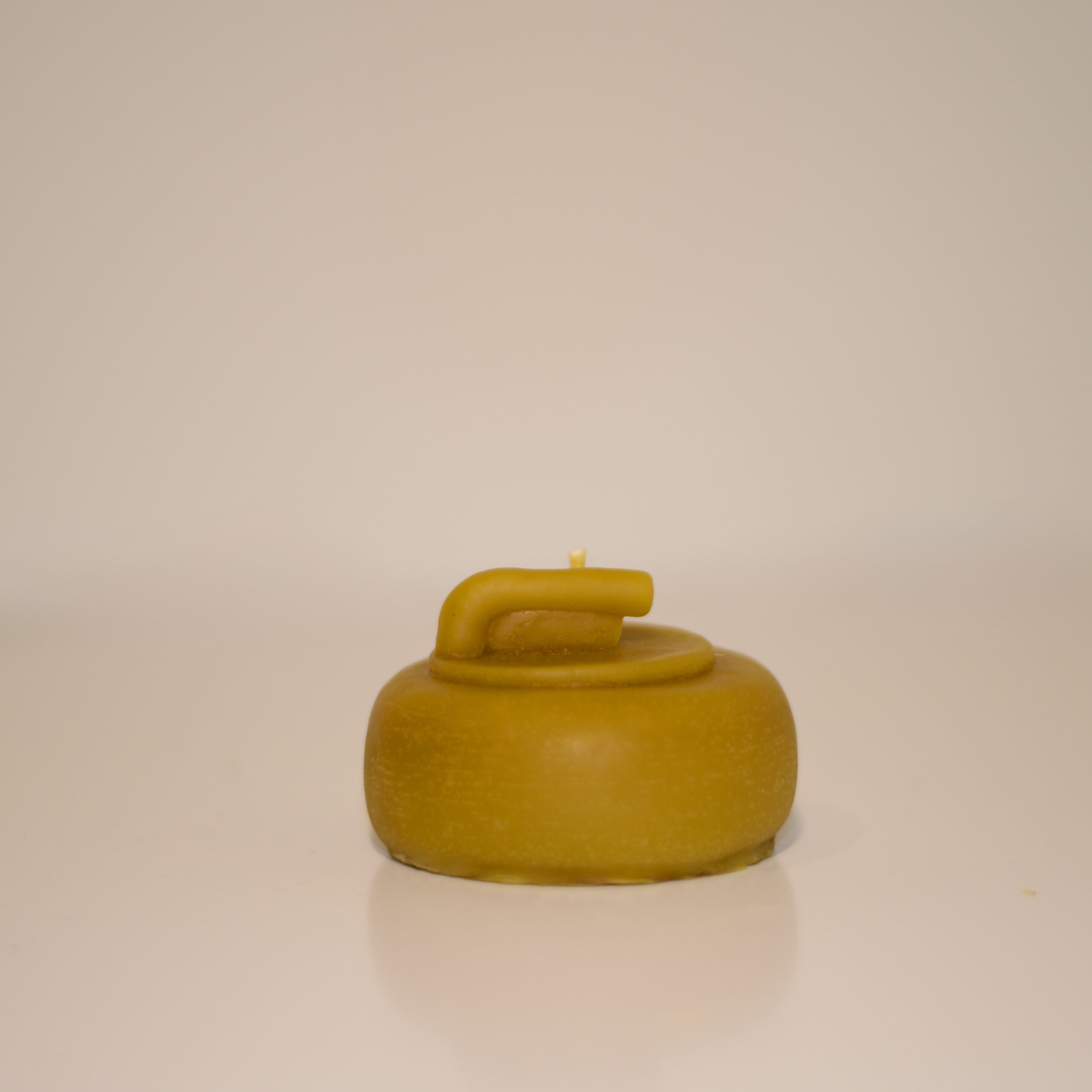 Curling Stone Beeswax Candle